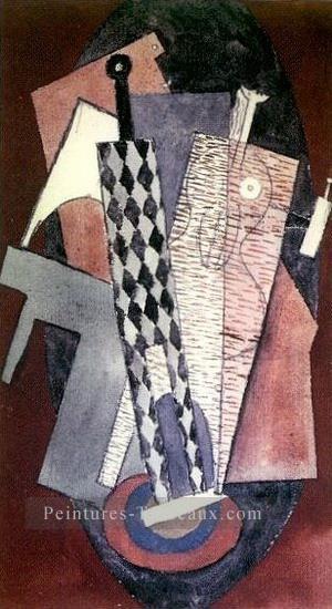 Arlequin locataire une bouteille et Femme 1915 cubisme Pablo Picasso Peintures à l'huile
